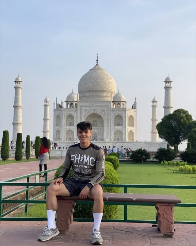 Traveller at the Taj Mahal gardens — private tour with Anwar Khan